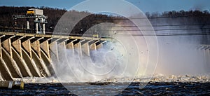 Conowingo Dam Hydroelectric Power Station releasing water with rainbow