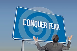 Conquer fear against blue sky