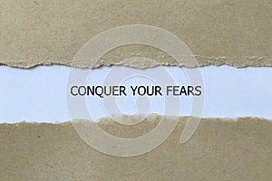 conquer your fears on white paper