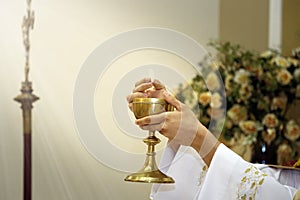 Consecration of bread and wafer wine photo