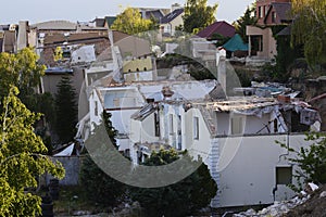 Consequences of a landslide in an expensive residential quarter on the beach