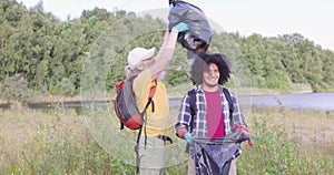 Conservation enthusiasts engaged in lakeside cleanup