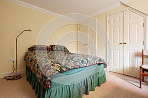 Conservatively furnished bedroom