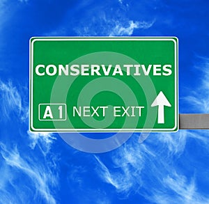 CONSERVATIVES road sign against clear blue sky