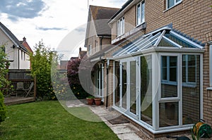 Conservatory and view of back garden, UK