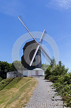 Conserved and protected windmill from Bruges city photo