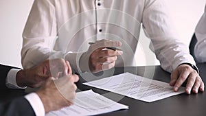 After consideration clauses of contract parties signing agreement closeup view