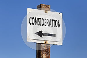 Considerations word and arrow signpost photo