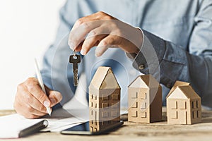 Considering buying a home, investing in real estate. Broker signs a sales agreement