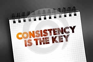 Consistency Is The Key text on notepad, concept background