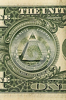 Conspiracy theory concept. All Seeing Eye and Pyramid on USA dollar banknote