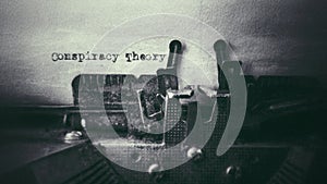 Conspiracy Theory text typed on paper with old typewriter in vintage background