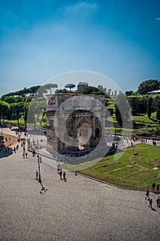 The Constantine Arch seen from the Coliseum in Rome, Italy photo