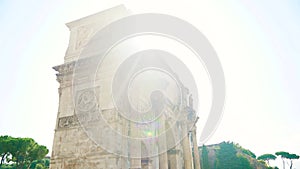 Constantine arch at sunrise in Rome, Italy. Slow motion move camera