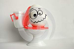 Constipation is a comical concept. an egg photo