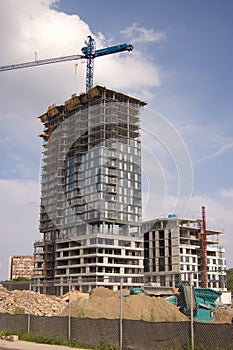 Constraction site with crain and new building