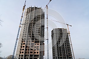 Constraction site with crain and new building