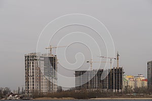 Constraction site with crain and new building