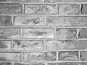 Texture of old blocks on cement wall in black and white color