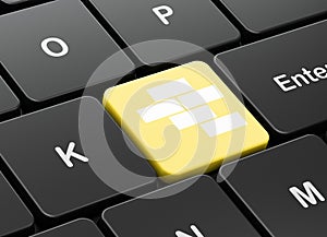 Constructing concept: Bricks on computer keyboard background