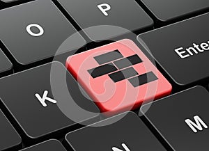 Constructing concept: Bricks on computer keyboard background