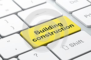 Constructing concept: Building Construction on computer keyboard background
