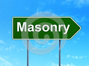 Constructing concept: Masonry on road sign background
