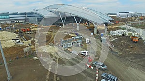 The construction of the airport with runway. Aerial view of Airport runway become a construction site. workers build the