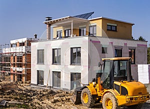 Construction area with new building and a shell