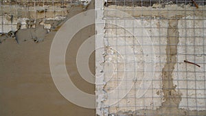 Construction background prepared surface of the facade wall of the building with a fixed mesh for cementing and painting