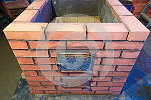 construction of brick ovens. brick stove for sauna