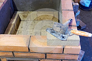construction of brick ovens. brick stove for sauna
