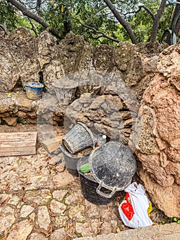 Construction Buckets and Stone Wall Worksite Tools