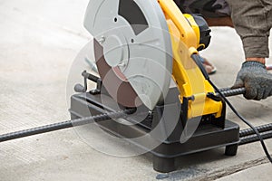 Construction builder worker with grinder machine cutting metal r