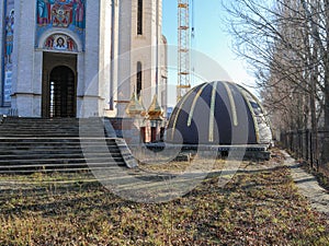 Construction of the building of the Russian Orthodox Church of the Kiev Patriarchate. Dome And Gilded Poppies Prepared For Ascent