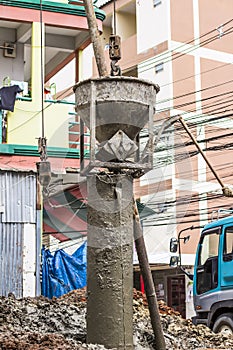 Construction building workers at concrete