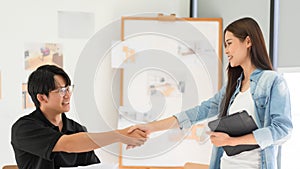 Construction business plan concept, Architects team shaking hands after successfully house project