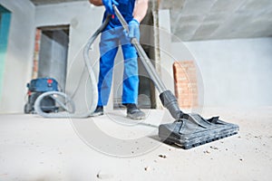 Construction cleaning service. dust removal with vacuum cleaner