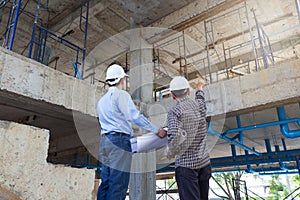 Construction concepts, Engineer and Architect working at Construction Site