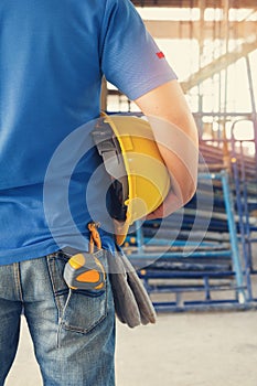 Construction concepts, Engineer and Architect working at Construction Site with blueprint