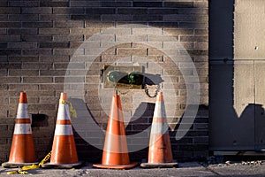 Construction Cones Waiting to be Used on the Sidewalk