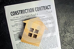 Construction contract and house. concept of real estate and planning of building a house. project home. investing in new buildings