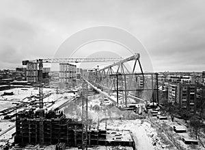 Construction Crane from Above. tower crane on the construction site aerial view. Aerial View Of construction site with