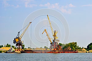 Construction crane on blue sky background, big crane on a construction site