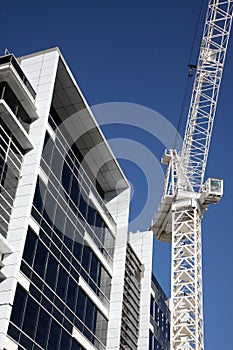 Construction crane with building