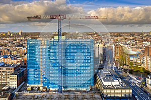 Construction crane building high rise apartment