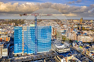 Construction crane building high rise apartment