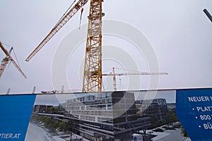 Construction crane in building industry