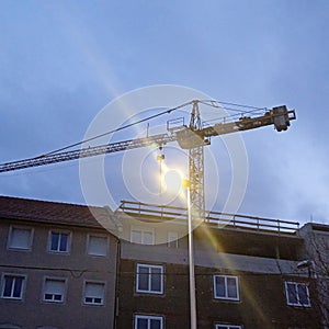 Construction crane in building industry