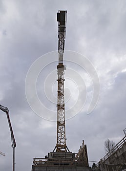 Construction crane in building industry